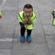 Children practice their postures during a roller blading class outside a park in Beijing, China, Wednesday, June 24, 2015.